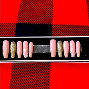 Nude and gold glitter nails